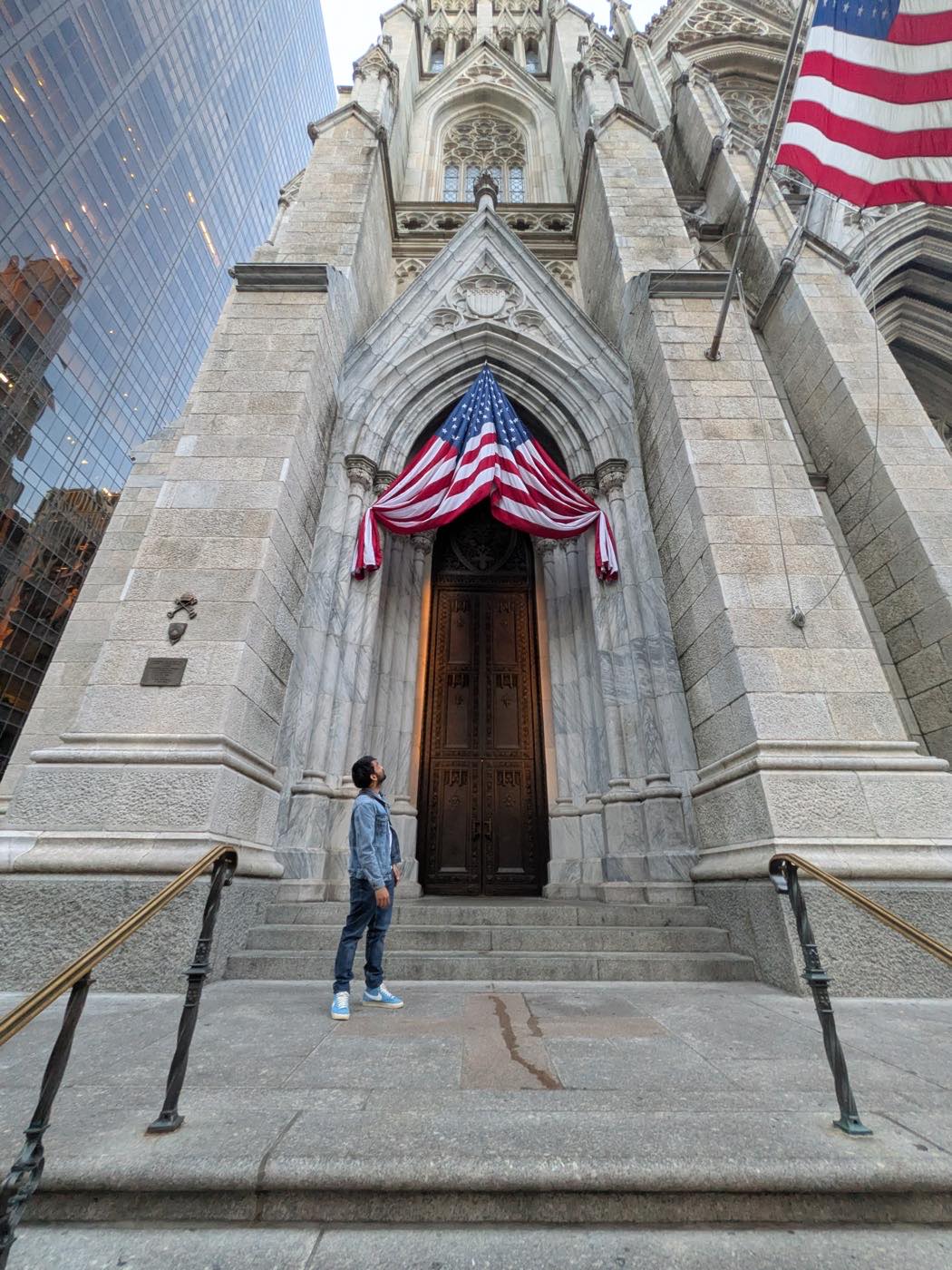 Standing on the steps of St. Patrick's Cathedral, Fifth Avenue, New York